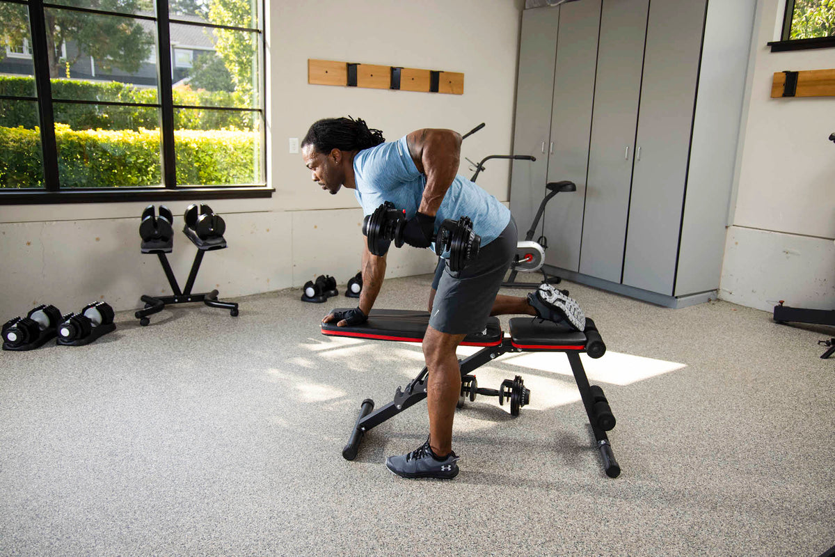 dumbbell rows on a bench