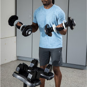 Home gym with Ativafit adjustable dumbbells and storage stand for fitness training