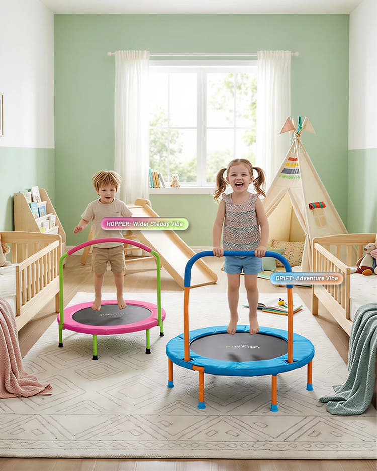 Two children playing on small trampolines in a room with a green wall and a window.