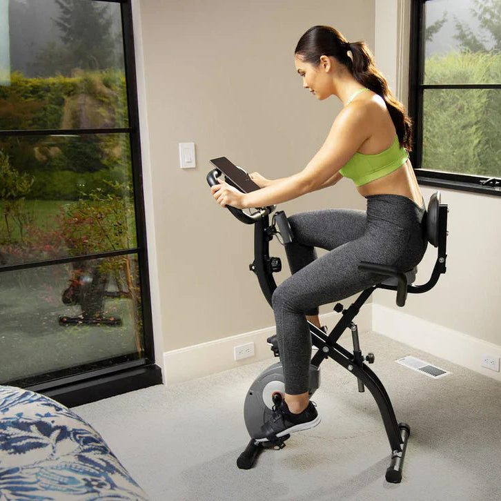 Ativafit foldable exercise bike in use at home